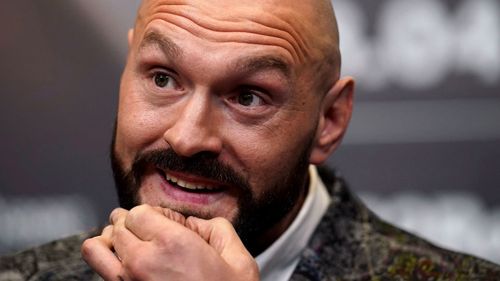 Tyson Fury attends a press conference at Wembley Stadium, London