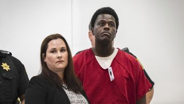 Wesley Brownlee stands with public defender Allison Nobert during his arraignment in San Joaquin County Superior Court on Tuesday, Oct. 18, 2022. 