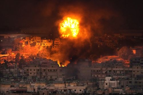 Flames rise after an Israeli airstrike in the southern suburbs of Beirut, Lebanon, Saturday, Sept. 28, 2024. 
