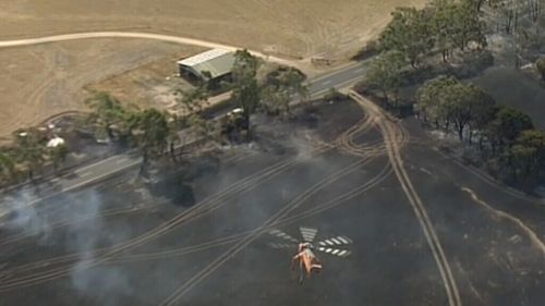 At least one structure is believed to have been lost. (9NEWS)