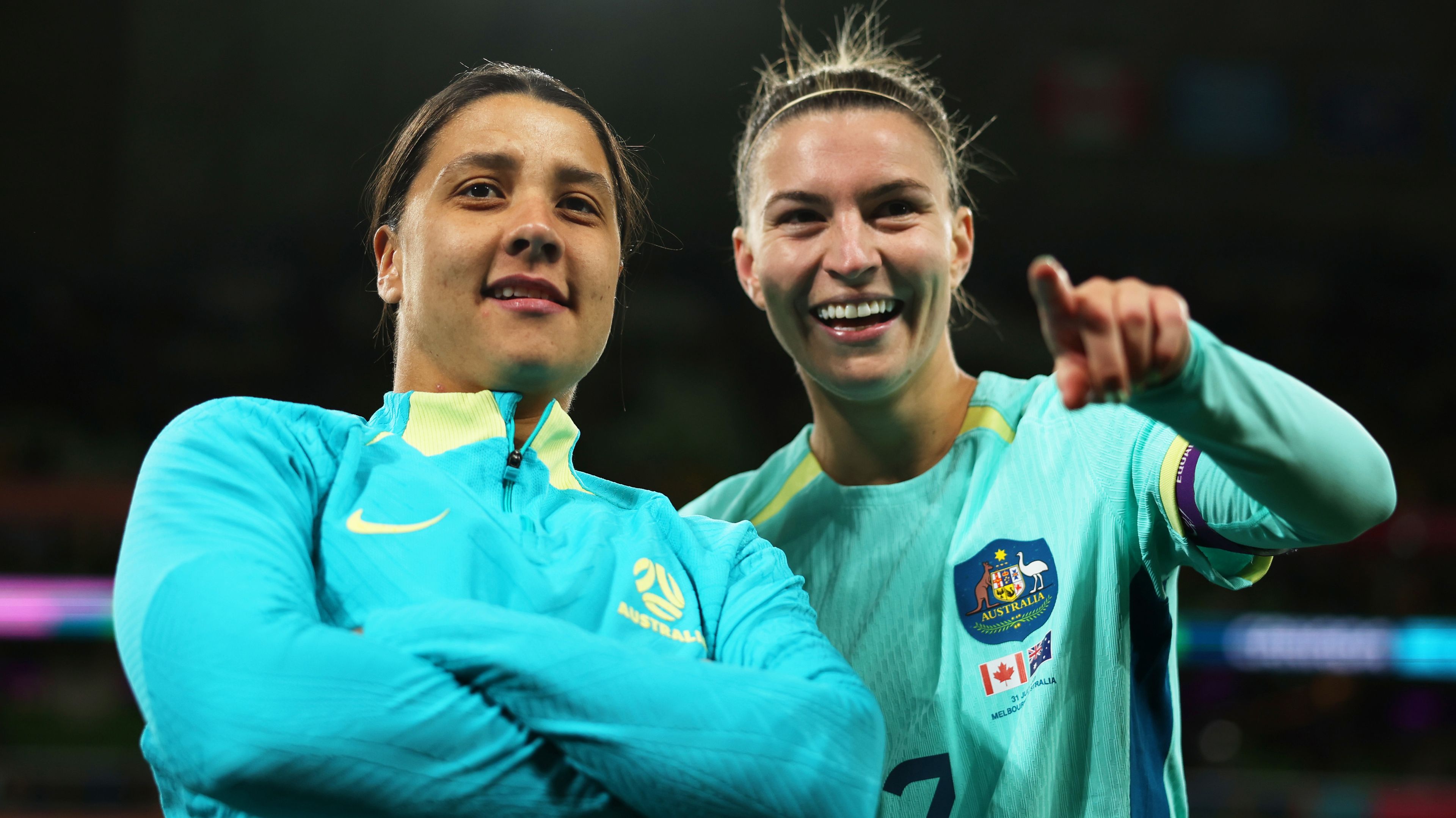 MELBOURNE, AUSTRALIA - JULY 31: Sam Kerr and Steph Catley of Australia applaud fans after the team&#x27;s 4-0 victory and qualification for the knockout stage following the FIFA Women&#x27;s World Cup Australia &amp; New Zealand 2023 Group B match between Canada and Australia at Melbourne Rectangular Stadium on July 31, 2023 in Melbourne, Australia. (Photo by Alex Pantling - FIFA/FIFA via Getty Images)