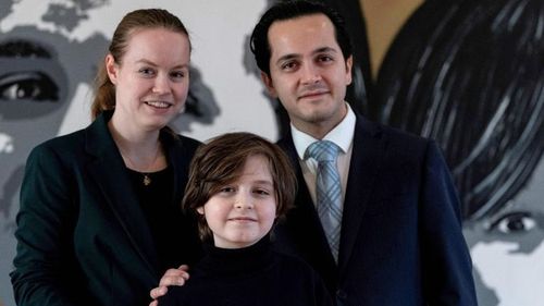 Belgian student Laurent Simons poses with his parents  Lydia and Alexander Simons during a photo session at his home on November 21, 2019 in Amsterdam.