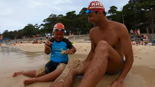 Eli-Luca and his dad Hamid at the beach.