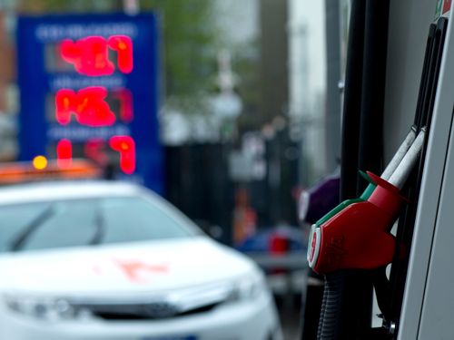 A taxi pulls into a Sydney petrol station.