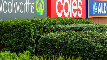 Woolworths, Coles and Aldi signage supermarket signage.