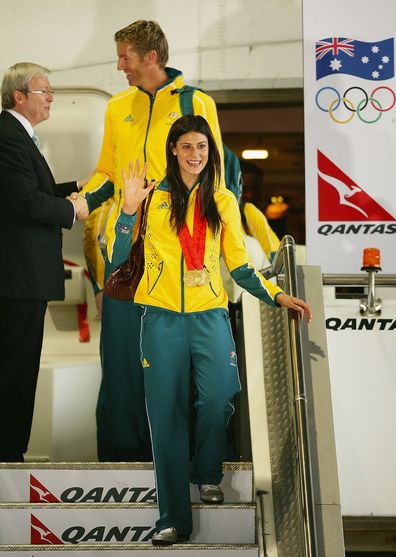 Stephanie Rice arrives home from with the Australian Olympic team.