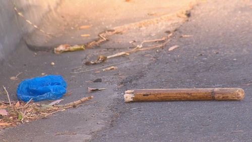 Men armed with knives, swords, bats and poles were allegedly involved in a violent brawl on a residential Queensland street.