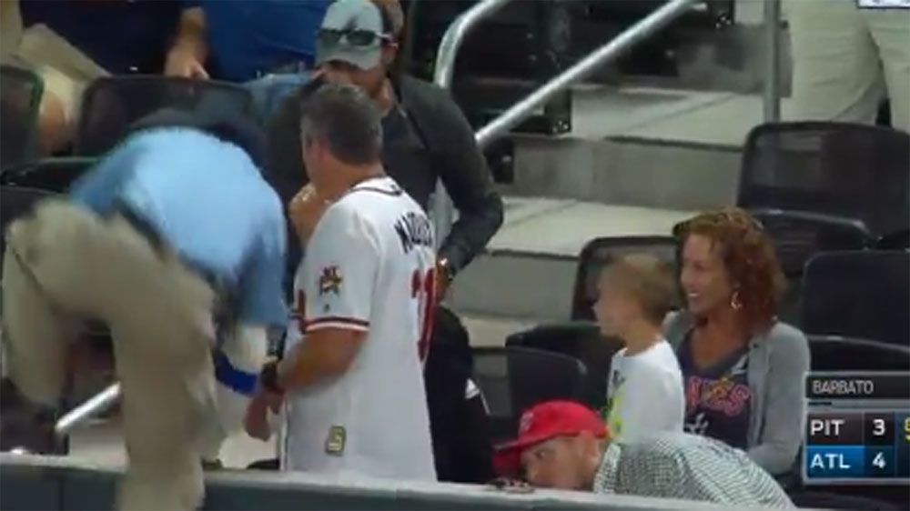 Security guard booed for taking baseball away from boy