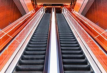 Where is the polite place to stand when riding an escalator in Australia?