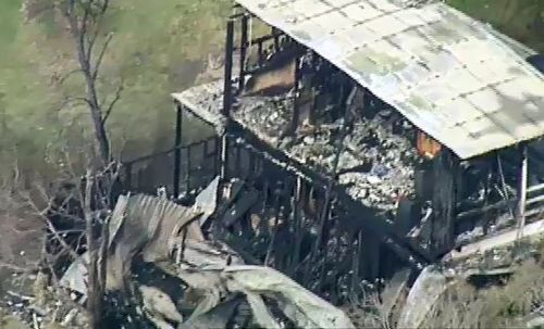 A father and son have been been found dead inside a home gutted by fire south of Geelong.

