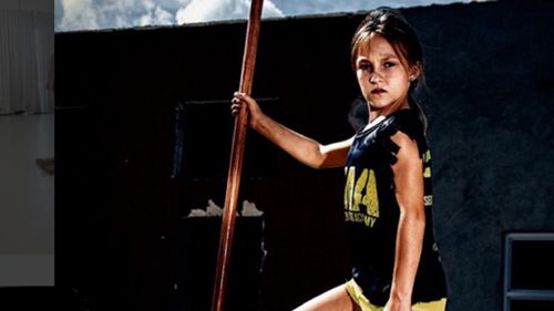 Nine-year-old girl takes on 24-hour US Navy obstacle race to prove bullies wrong