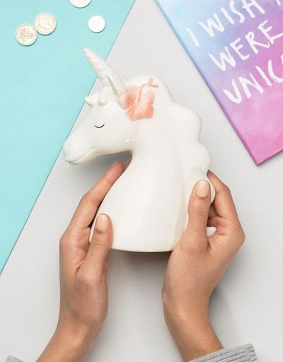 <a href="http://www.asos.com/au/new-look/new-look-unicorn-flower-moneybox/prd/8034865?iid=8034865&amp;clr=White&amp;SearchQuery=unicorn&amp;pgesize=36&amp;pge=0&amp;totalstyles=48&amp;gridsize=3&amp;gridrow=3&amp;gridcolumn=1" target="_blank" draggable="false">Asos New Look Unicorn Flower Moneybox, $12.</a>