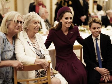 Catherine, Princess of Wales and Prince George join Second World War veterans at a tea party in Buckingham Palace following the military procession to mark the 80th anniversary of VE Day on May 5, 2025 in London, England. 