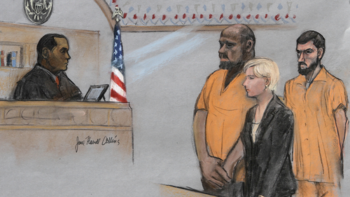 In this June 19, 2015, file courtroom sketch, David Wright, second from left, is depicted standing before Magistrate Judge Donald Cabell, left, with attorney Jessica Hedges, second from right, and Nicholas Rovinski, right, during a hearing in federal court in Boston. 