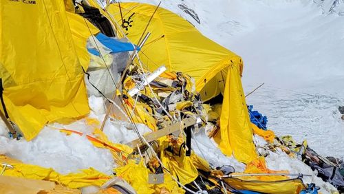 A photo of tents and rubbish on K2