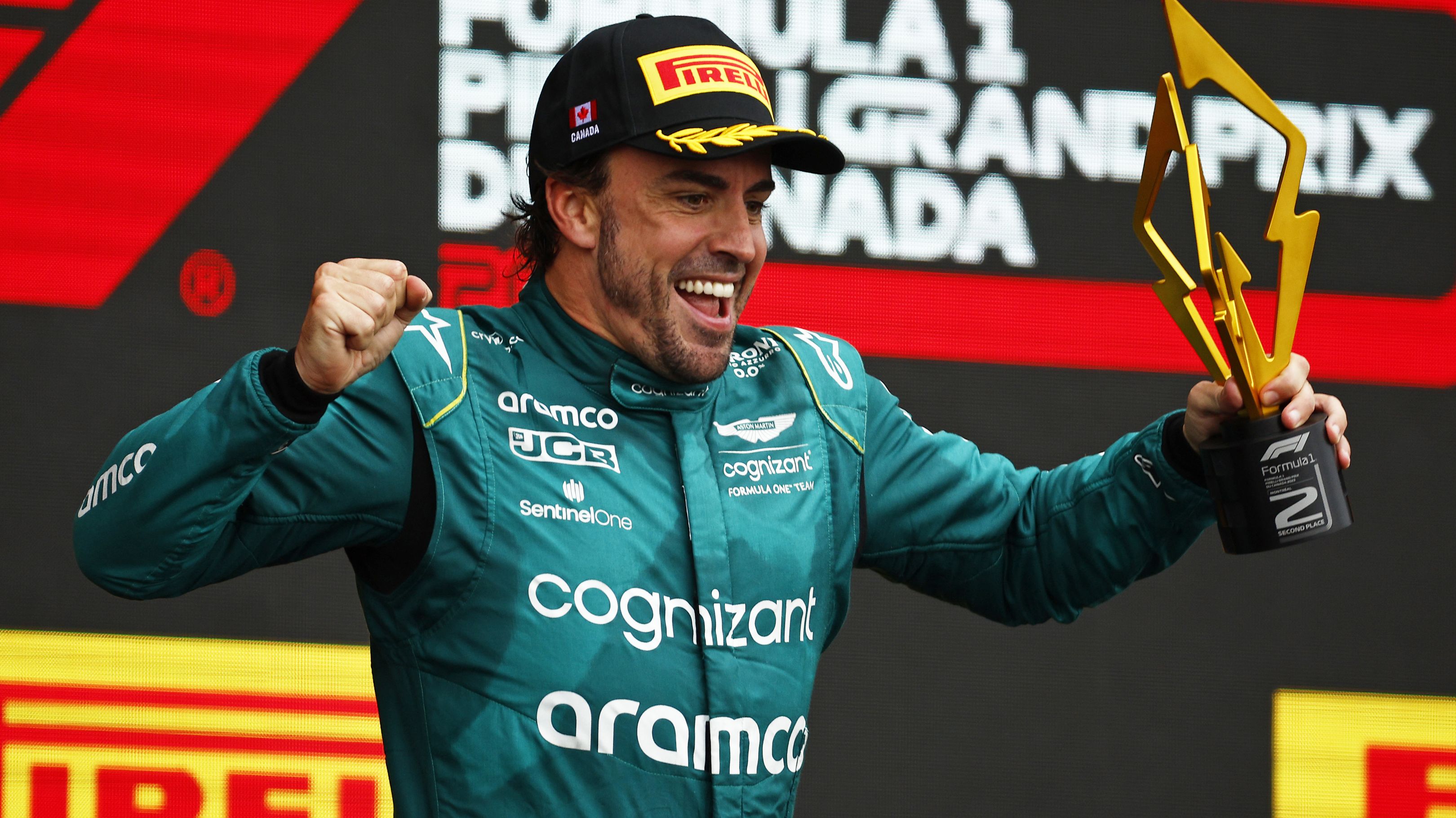 Second placed Fernando Alonso of Spain and Aston Martin F1 Team celebrates on the podium during the F1 Grand Prix of Canada at Circuit Gilles Villeneuve on June 18, 2023 in Montreal, Quebec. (Photo by Jared C. Tilton/Getty Images)