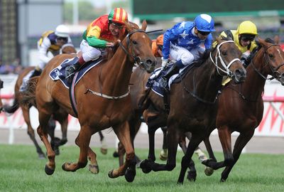 He took the Mackinnon Stakes onboaryd Happy Trails. (AAP)