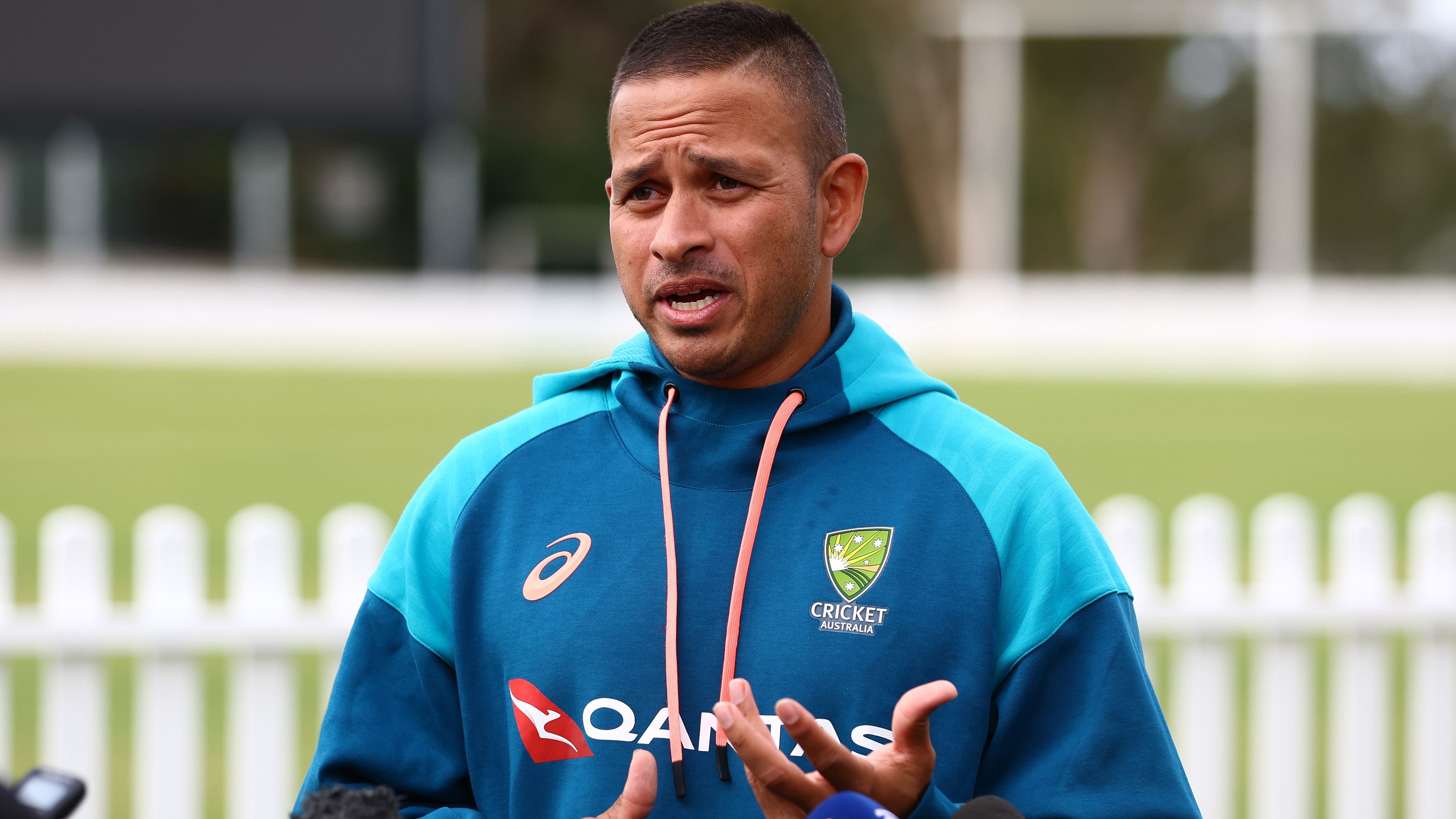 BRISBANE, AUSTRALIA - MAY 15: Usman Khawaja speaks to the media during a Cricket Australia media opportunity after the announcement of the 2023/24 International Season at Allan Border Field  on May 15, 2023 in Brisbane, Australia. (Photo by Chris Hyde/Getty Images)