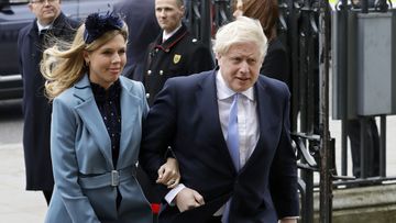 In this Monday, March 9, 2020, file photo Britain&#x27;s Prime Minister Boris Johnson and his partner Carrie Symonds arrive to attend the annual Commonwealth Day service at Westminster Abbey in London.