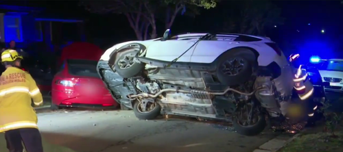 Emergency services were called to the scene and righted the vehicle. Picture: 9NEWS