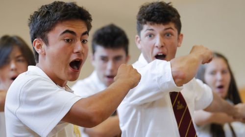 Students perform the Haka during arrival of New Zealand's Prime Minister Jacinda Ardern, during a high school visit in Christchurch, New Zealand