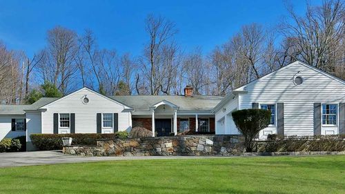 The Chappaqua house the Clintons bought next door to their own.