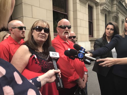 Simone Quinlan's supporters wore red at court as her drug-taking killers were jailed today.