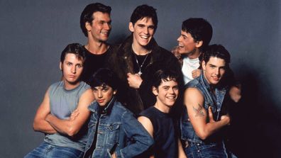 Patrick Swayze, Matt Dillon, Rob Lowe, Emilio Estevez, Ralph Macchio, Thomas C. Howell, and Tom Cruise on the set of The Outsiders.