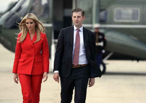 Ivanka Trump, the daughter of President Donald Trump, left walks Eric Trump, son of President Donald Trump, as they walk to board Air Force One with President Donald Trump for a trip to Tampa, Fla., to attend a campaign rally, Tuesday, July 31, 2018, in Andrews Air Force Base, Md. (AP Photo/Evan Vucci)