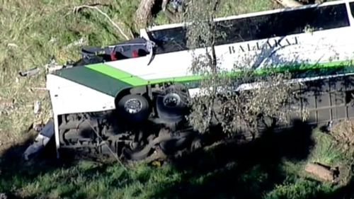 The bus left the highway and rolled down the embankment, police said. (9NEWS)