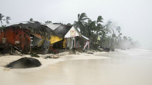A gift shop damaged in the crossing of Hurricane Maria is shown on Cofrecito Beach, Bavaro, Dominican Republic.