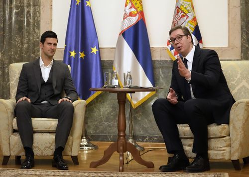 Serbian tennis player Novak Djokovic, left, speaks with Serbia's President Aleksandar Vucic in Belgrade, Serbia, Thursday, Feb. 3, 2022. 
