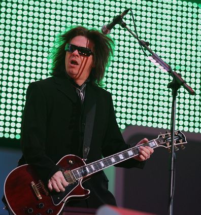 Andy Taylor of Duran Duran performs in concert after the Medal Ceremony at the Medals Plaza on Day 5 of the Turin 2006 Winter Olympic Games, February 15, 2006 in Turin, Italy.