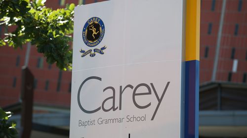 Carey Baptist Grammar has been shut down after an adult member of the school community developed symptoms consistent with COVID-19. 