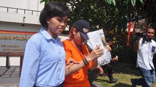 Police take Robert Ellis's Indonesian wife of 25 years, Noor Ellis from her detention cell to an investigation room in the Crime Detectives Division of Bali Provincial Police. (AAP)