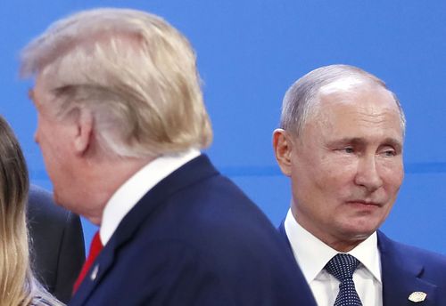 While Trump has cancelled a planned formal meeting with Russian President Putin, the pair were captured together at the photo session.