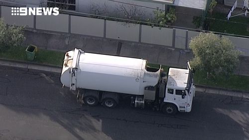 The body was discovered by the garbage collector about 8am. (9NEWS)
