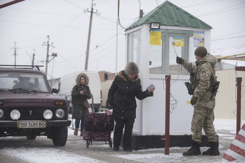 The checkpoint between Milove in Ukraine and Chertkovo, a village split in half.