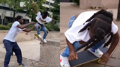 Little girl and her dad practicing a skateboarding move.