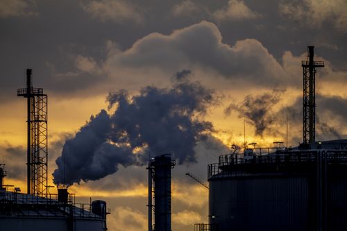 Pollution rises from the BASF chemical plant in Ludwigshafen, Germany, Monday, Nov. 7, 2022. (AP Photo/Michael Probst)