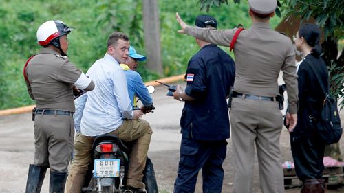 The world's media is currently stationed 3km from the cave entrance.