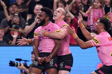 Sunia Turuva celebrates with teammates after scoring a try during the round four NRL match between the Sydney Roosters and the Penrith Panthers.