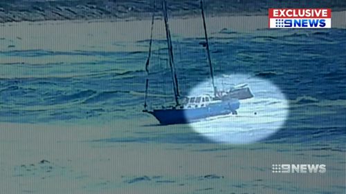 Video shows the men leaping for their lives as the yacht is battered by a two-metre swell. 