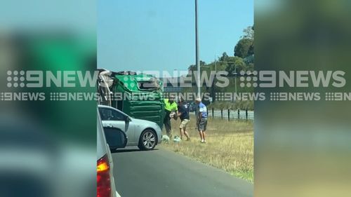 Exclusive video captured the moment the driver escaped his damaged truck.