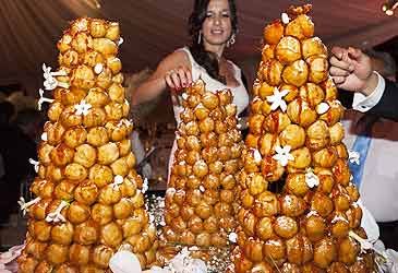 What is used to hold a croquembouche together?