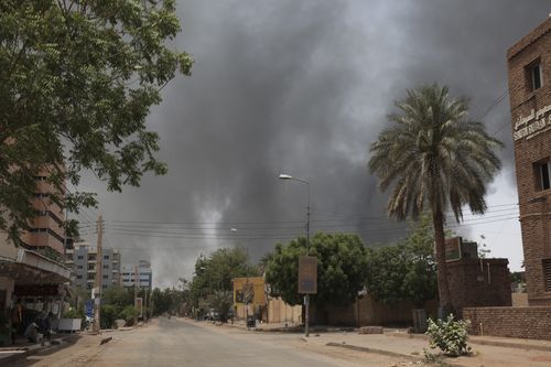 Smoke is seen rising in Khartoum, Sudan, Saturday, April 15, 2023.  