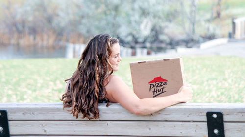 Nicole Larson said pizza always makes her smile. (Facebook)