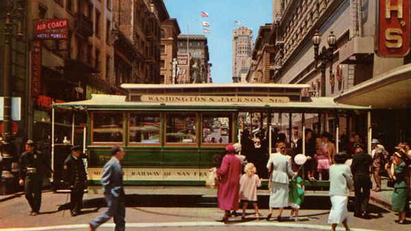 Vintage postcard showing a cable car on the turntable in downtown San Francisco.