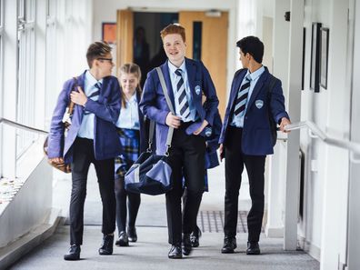 High school students walking to class