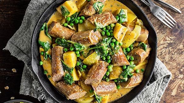 Curried sausages with yellow fried rice